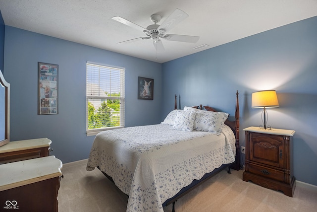 13992 Wynngate Ln, Fishers, IN 46038 - bedroom with light carpet and a ceiling fan