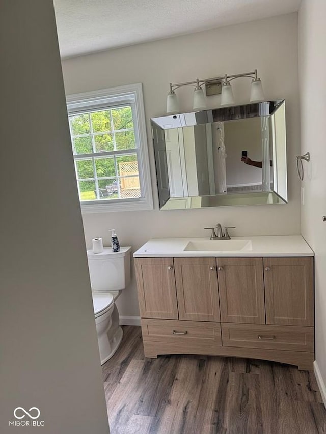 935 S County Road 185 E, North Vernon, IN 47265 - bathroom with vanity and wood finished floors