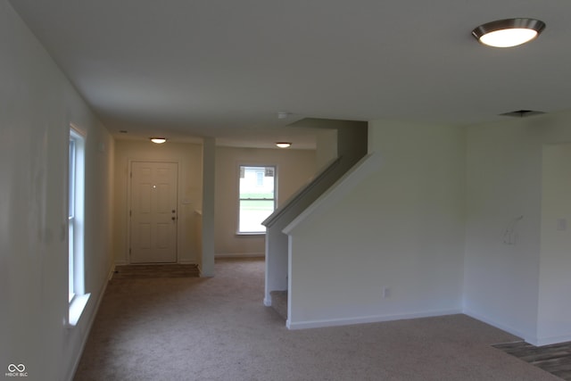 1029 E Brandy Blvd E, Ellettsville, IN 47429 - entrance foyer featuring light carpet and stairway