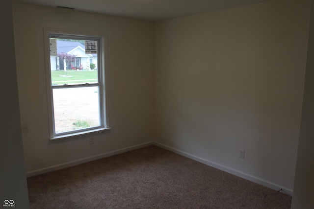 1029 E Brandy Blvd E, Ellettsville, IN 47429 - unfurnished room with carpet flooring and baseboards