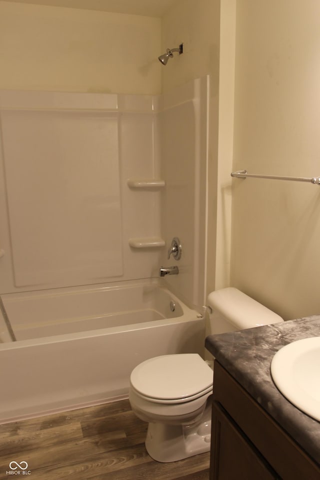 1029 E Brandy Blvd E, Ellettsville, IN 47429 - full bath with wood finished floors, vanity, and washtub / shower combination