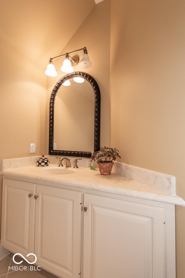 4636 S Hawks Way, Bloomington, IN 47401 - bathroom with vanity and vaulted ceiling