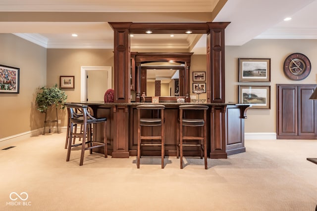 4636 S Hawks Way, Bloomington, IN 47401 - indoor wet bar with light colored carpet, crown molding, and recessed lighting