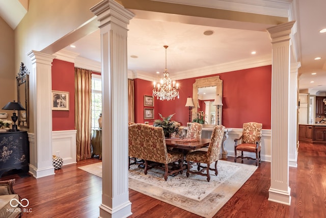 4636 S Hawks Way, Bloomington, IN 47401 - dining area featuring decorative columns, wainscoting, dark wood-type flooring, ornamental molding, and a decorative wall