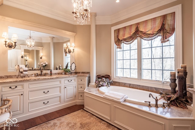 4636 S Hawks Way, Bloomington, IN 47401 - full bathroom with a chandelier, vanity, a garden tub, wood finished floors, and ornamental molding