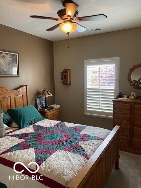 3354 Nottinghill Dr, Plainfield, IN 46168 - bedroom featuring light carpet and ceiling fan