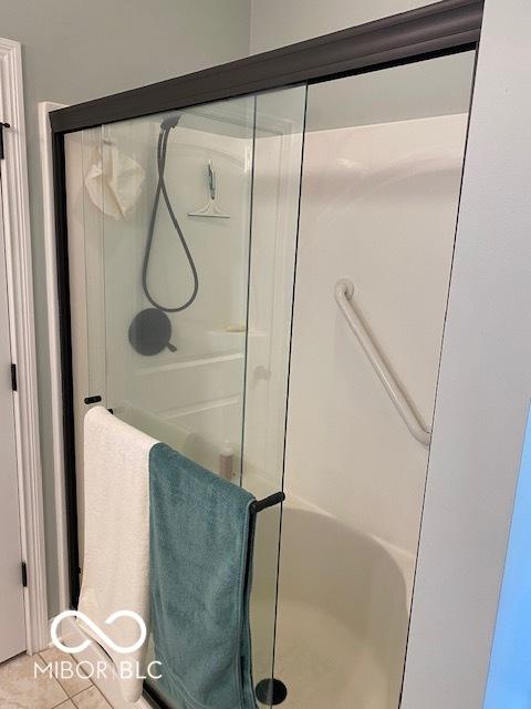 3354 Nottinghill Dr, Plainfield, IN 46168 - bathroom with a stall shower and tile patterned flooring