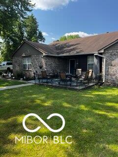 241 Deborah Ln, Whiteland, IN 46184 - rear view of property with a yard and a patio area