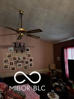 241 Deborah Ln, Whiteland, IN 46184 - living area with lofted ceiling, a textured ceiling, and ceiling fan