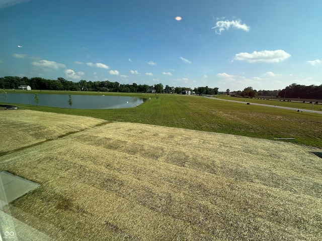 7909 Magnolia St, New Palestine, IN 46163 - view of home's community featuring a water view and a lawn