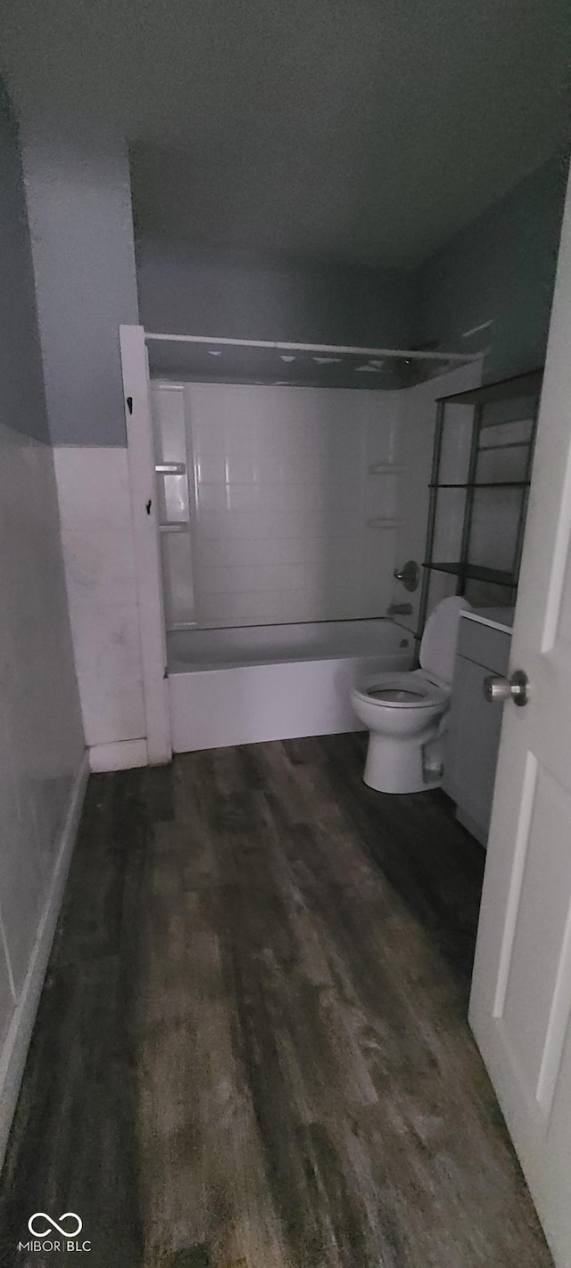 435 N Rural St NE, Indianapolis, IN 46201 - bathroom featuring shower / bathtub combination and wood finished floors