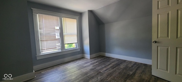 435 N Rural St NE, Indianapolis, IN 46201 - bonus room with vaulted ceiling and dark wood-style floors