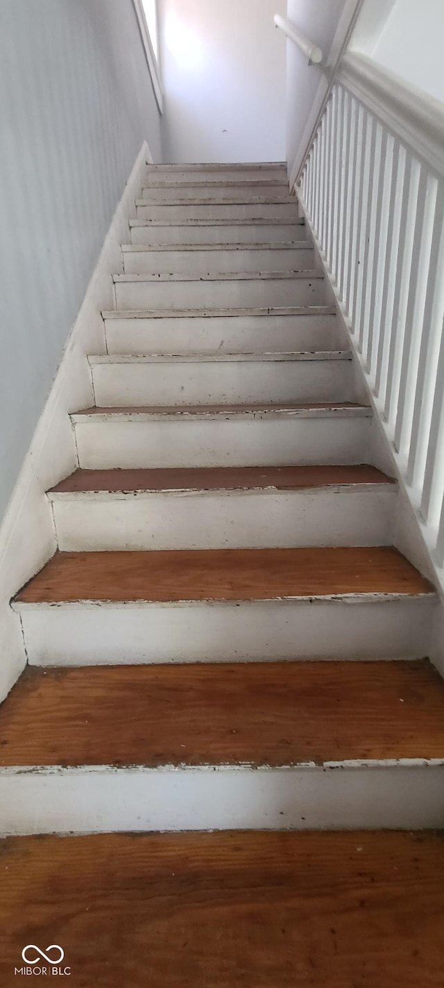 435 N Rural St NE, Indianapolis, IN 46201 - staircase with wood finished floors
