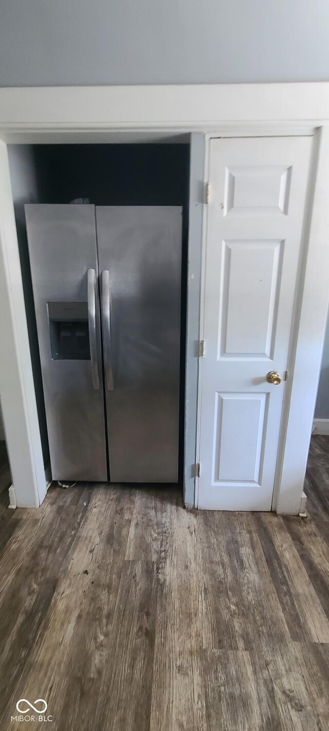 435 N Rural St NE, Indianapolis, IN 46201 - kitchen view of stainless steel refrigerator with ice dispenser and wood finished floors