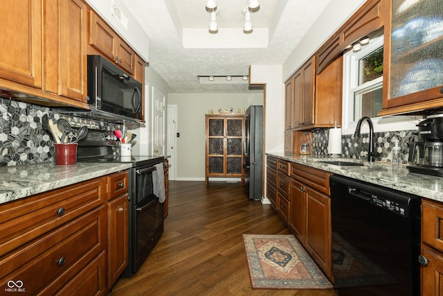 13 Fairlane Dr, Brownsburg, IN 46112 - kitchen featuring black appliances, backsplash, dark wood-style flooring, and light stone countertops