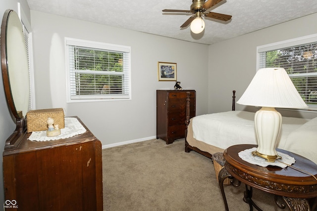 13 Fairlane Dr, Brownsburg, IN 46112 - bedroom featuring light colored carpet, multiple windows, a textured ceiling, and ceiling fan