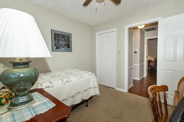 13 Fairlane Dr, Brownsburg, IN 46112 - bedroom with a closet, carpet flooring, a ceiling fan, and a textured ceiling