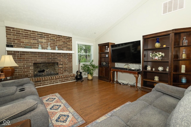 13 Fairlane Dr, Brownsburg, IN 46112 - living room with wood finished floors, lofted ceiling, and a fireplace