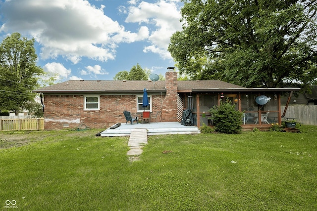 13 Fairlane Dr, Brownsburg, IN 46112 - rear view of house with a sunroom, brick siding, a chimney, roof with shingles, and crawl space
