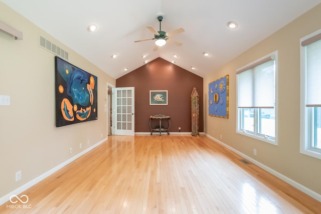 2608 S Trotters Run, Bloomington, IN 47401 - unfurnished living room featuring light wood-style floors, ceiling fan, lofted ceiling, and recessed lighting