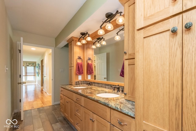 2608 S Trotters Run, Bloomington, IN 47401 - full bathroom with wood finished floors and double vanity
