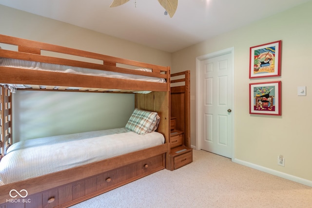 2608 S Trotters Run, Bloomington, IN 47401 - carpeted bedroom with baseboards and a ceiling fan