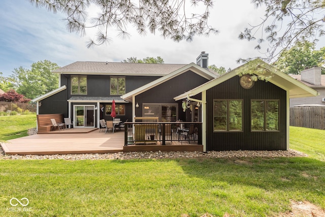 2608 S Trotters Run, Bloomington, IN 47401 - rear view of property with a chimney, a deck, and a shingled roof
