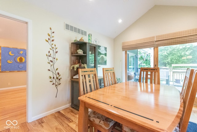 2608 S Trotters Run, Bloomington, IN 47401 - dining room with light wood finished floors, high vaulted ceiling, and recessed lighting