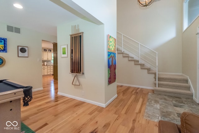 2608 S Trotters Run, Bloomington, IN 47401 - foyer entrance featuring light wood finished floors, stairway, billiards table, and recessed lighting