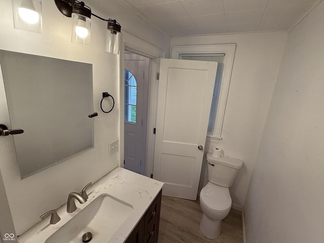 2607 N Henderson Rd, Rushville, IN 46173 - half bathroom with wood finished floors and vanity