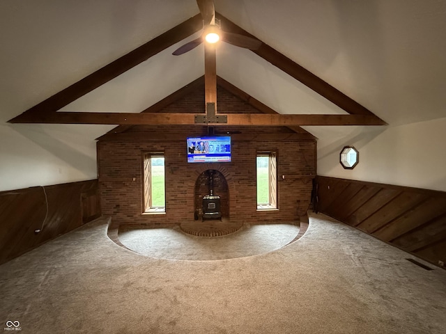 2607 N Henderson Rd, Rushville, IN 46173 - detailed view of carpet, beamed ceiling, wooden walls, ceiling fan, and wainscoting