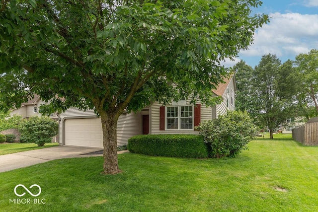 6937 Thousand Oaks Dr, Indianapolis, IN 46214 - view of property hidden behind natural elements featuring concrete driveway and an attached garage
