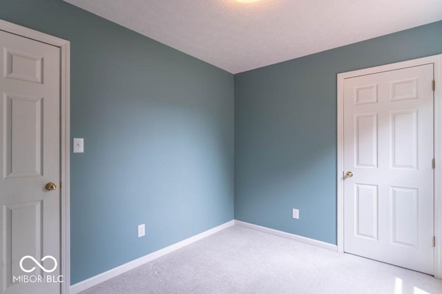 6937 Thousand Oaks Dr, Indianapolis, IN 46214 - carpeted empty room with baseboards