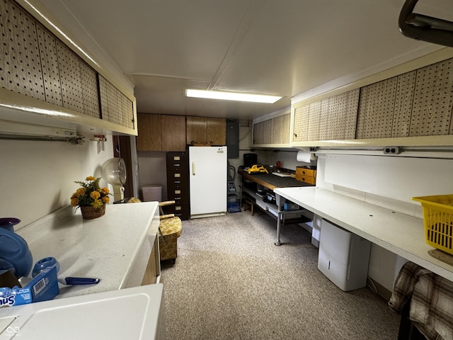 8664 S Nash Dr, Nineveh, IN 46164 - kitchen featuring freestanding refrigerator, light countertops, and light colored carpet
