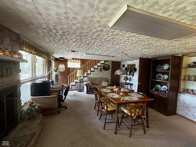 8664 S Nash Dr, Nineveh, IN 46164 - dining area with carpet flooring, stairway, and a fireplace