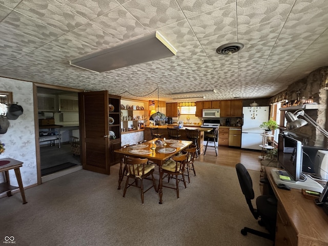 8664 S Nash Dr, Nineveh, IN 46164 - dining area with a desk, wallpapered walls, a paneled ceiling, and carpet floors
