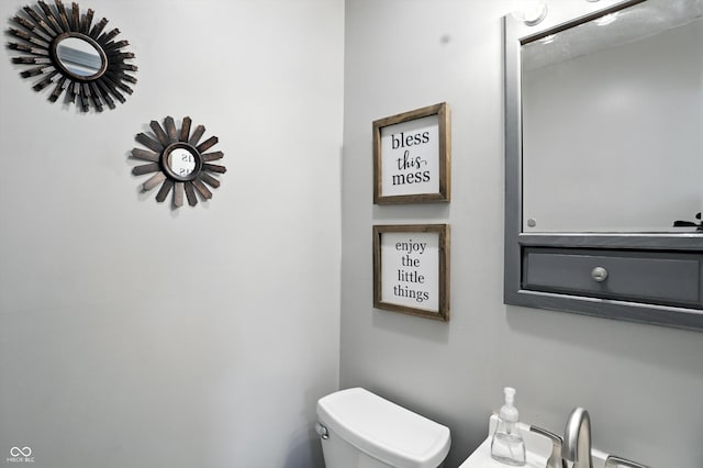 7113 Chandler Dr, Indianapolis, IN 46217 - half bathroom with toilet and a sink
