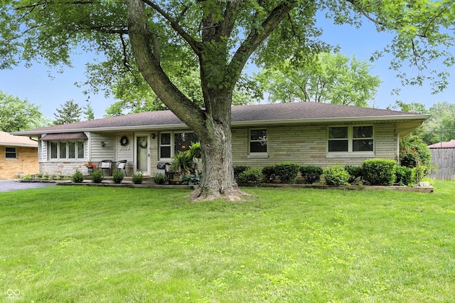 7113 Chandler Dr, Indianapolis, IN 46217 - view of front of house with a front yard
