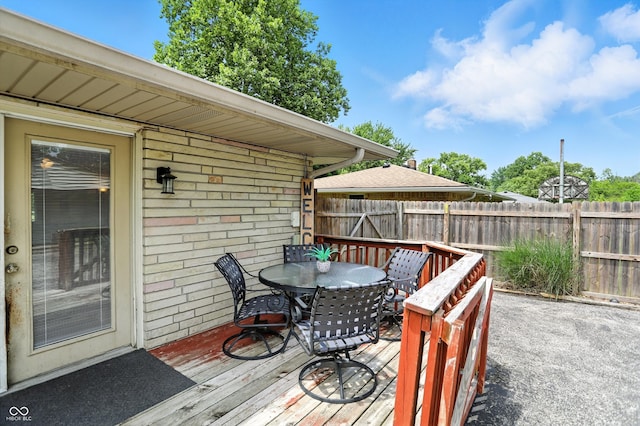 7113 Chandler Dr, Indianapolis, IN 46217 - deck featuring outdoor dining area