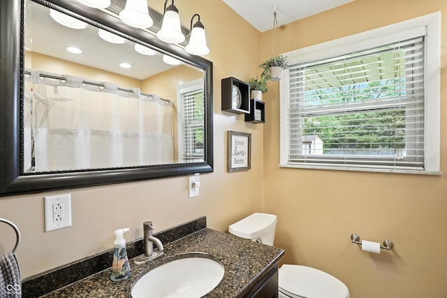 7113 Chandler Dr, Indianapolis, IN 46217 - bathroom featuring vanity and a shower with curtain