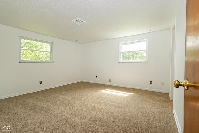 1217 S Post Rd, Indianapolis, IN 46239 - carpeted empty room with baseboards