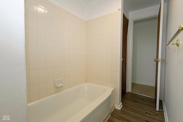 1217 S Post Rd, Indianapolis, IN 46239 - full bathroom featuring wood finished floors and baseboards
