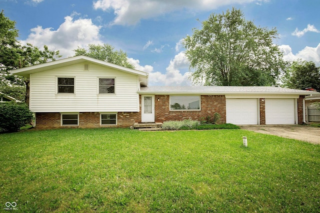 1217 S Post Rd, Indianapolis, IN 46239 - tri-level home with a garage, a front lawn, concrete driveway, and brick siding