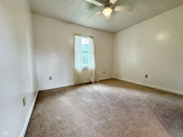 100 Justin Dr, Mooresville, IN 46158 - spare room with carpet flooring, ceiling fan, and a textured ceiling