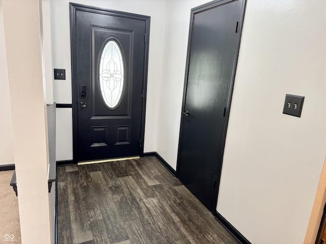 100 Justin Dr, Mooresville, IN 46158 - foyer featuring dark wood-type flooring and baseboards