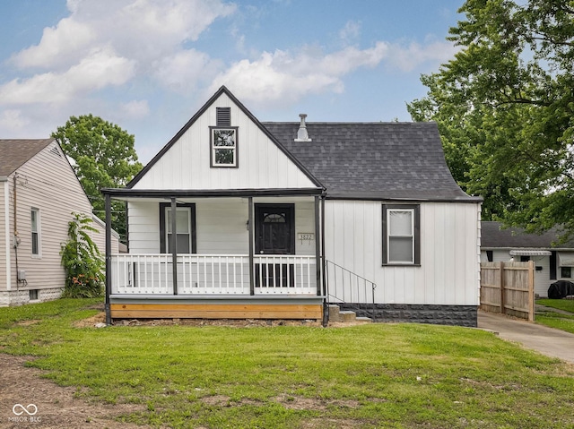 3822 Haverhill Dr, Anderson, IN 46013 - view of front of property featuring covered porch, a shingled roof, and board and batten siding