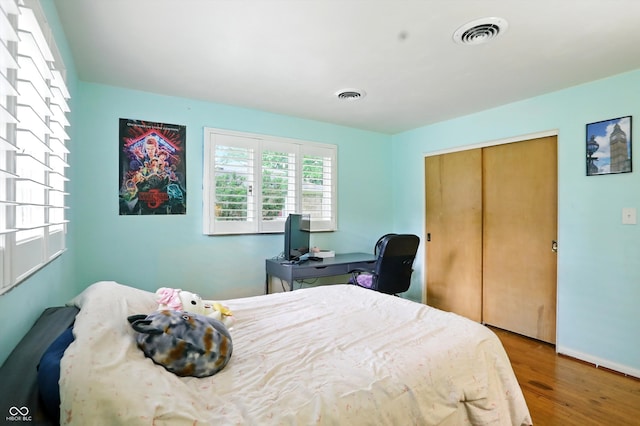 4340 Ashbourne Ln, Indianapolis, IN 46226 - bedroom with wood finished floors and a closet
