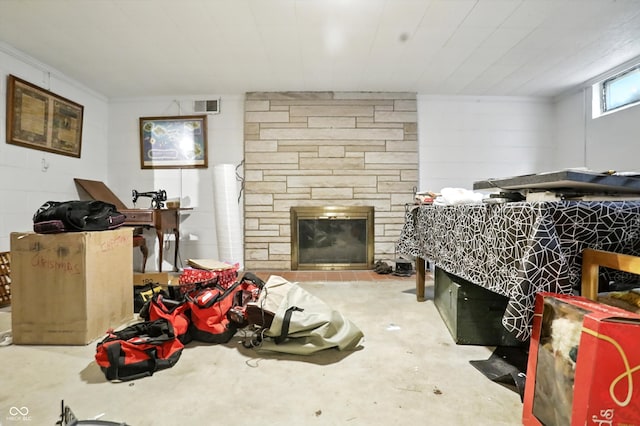 4340 Ashbourne Ln, Indianapolis, IN 46226 - bedroom with a stone fireplace and unfinished concrete flooring