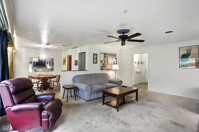 4340 Ashbourne Ln, Indianapolis, IN 46226 - carpeted living area featuring a ceiling fan and a chandelier