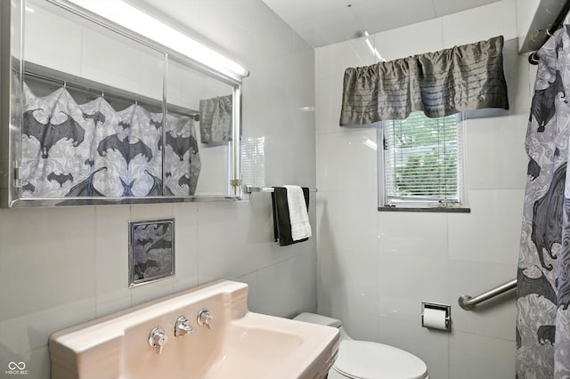 4340 Ashbourne Ln, Indianapolis, IN 46226 - bathroom with toilet and tile walls